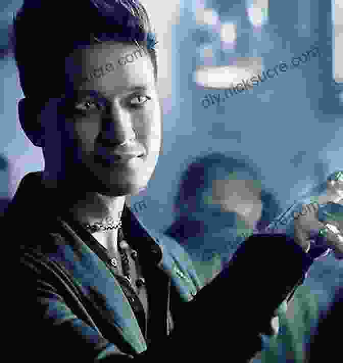 Magnus Bane, A Handsome Warlock With Piercing Blue Eyes, Stands With His Arms Crossed, A Mysterious Expression On His Face. The Bane Chronicles Cassandra Clare
